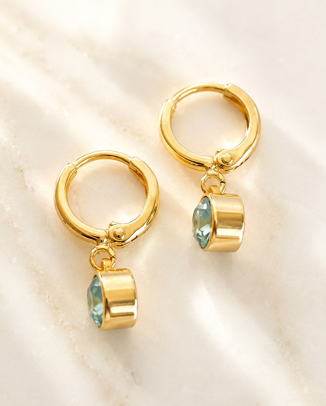 Boucles d'oreilles créoles étoile de mer dorées
