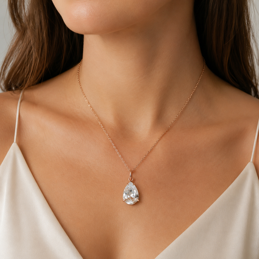 Clear pear pendant necklace