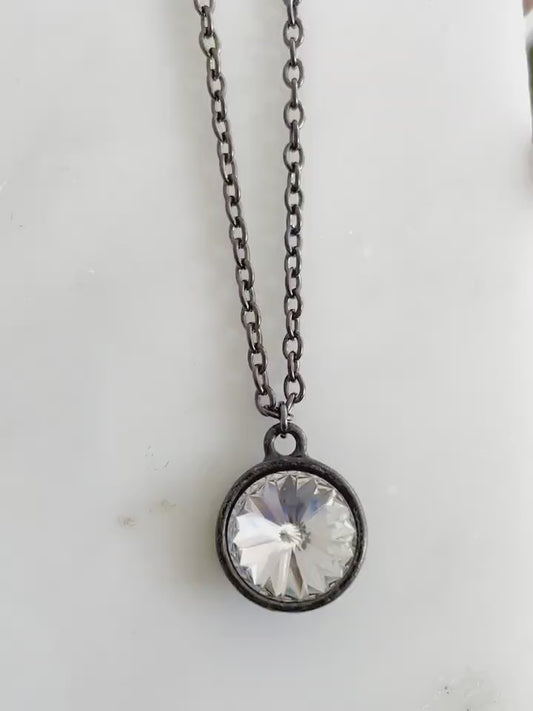 Crystal clear rivoli and gunmetal necklace