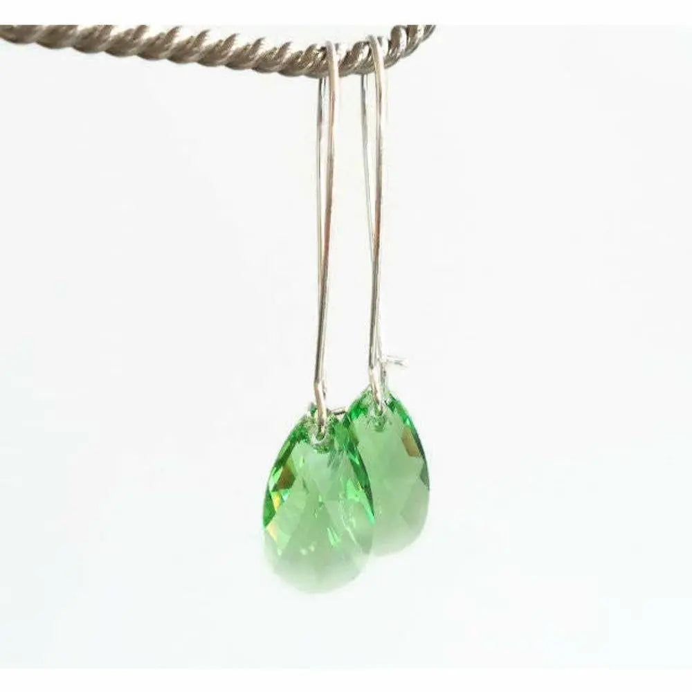 Long peridot crystal earrings LoveYourBling