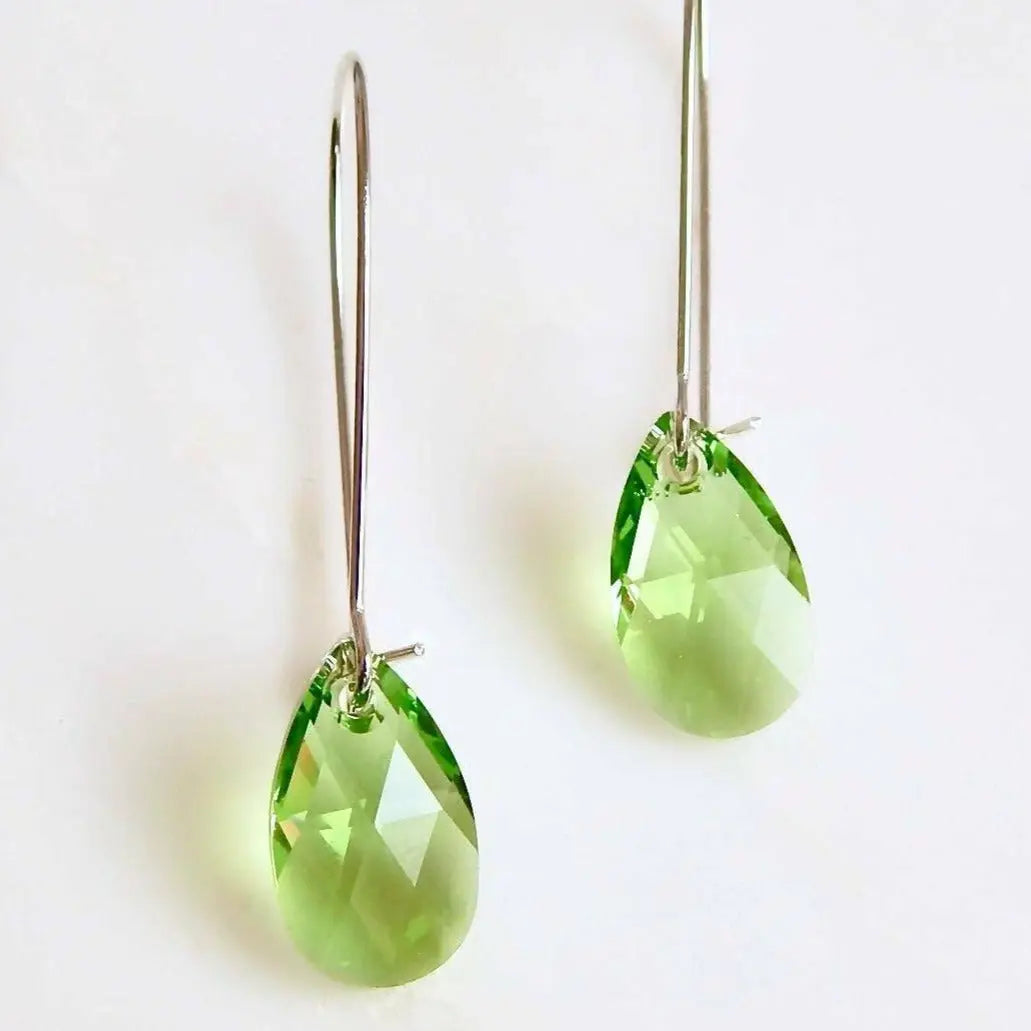 Long peridot crystal earrings LoveYourBling