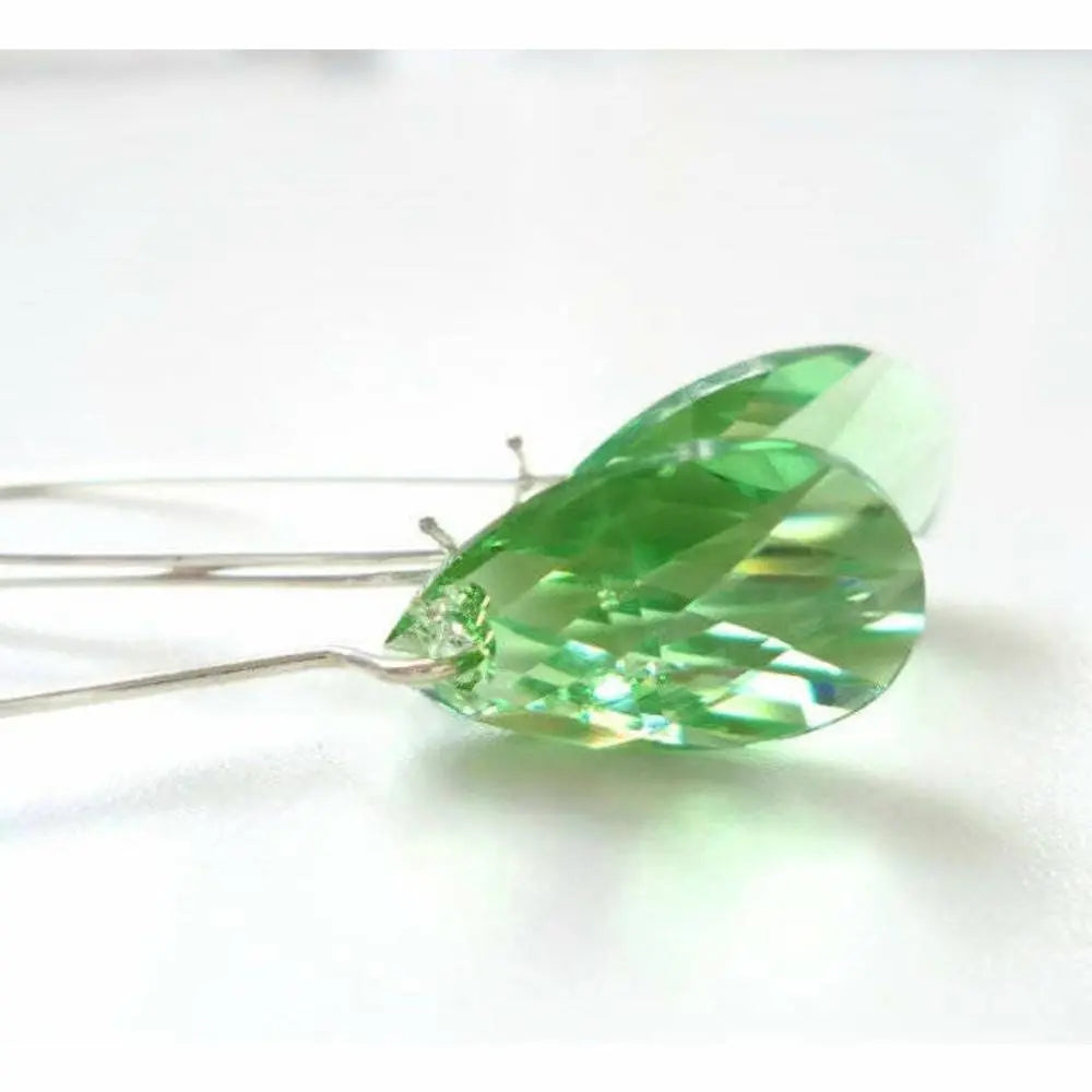 Long peridot crystal earrings LoveYourBling