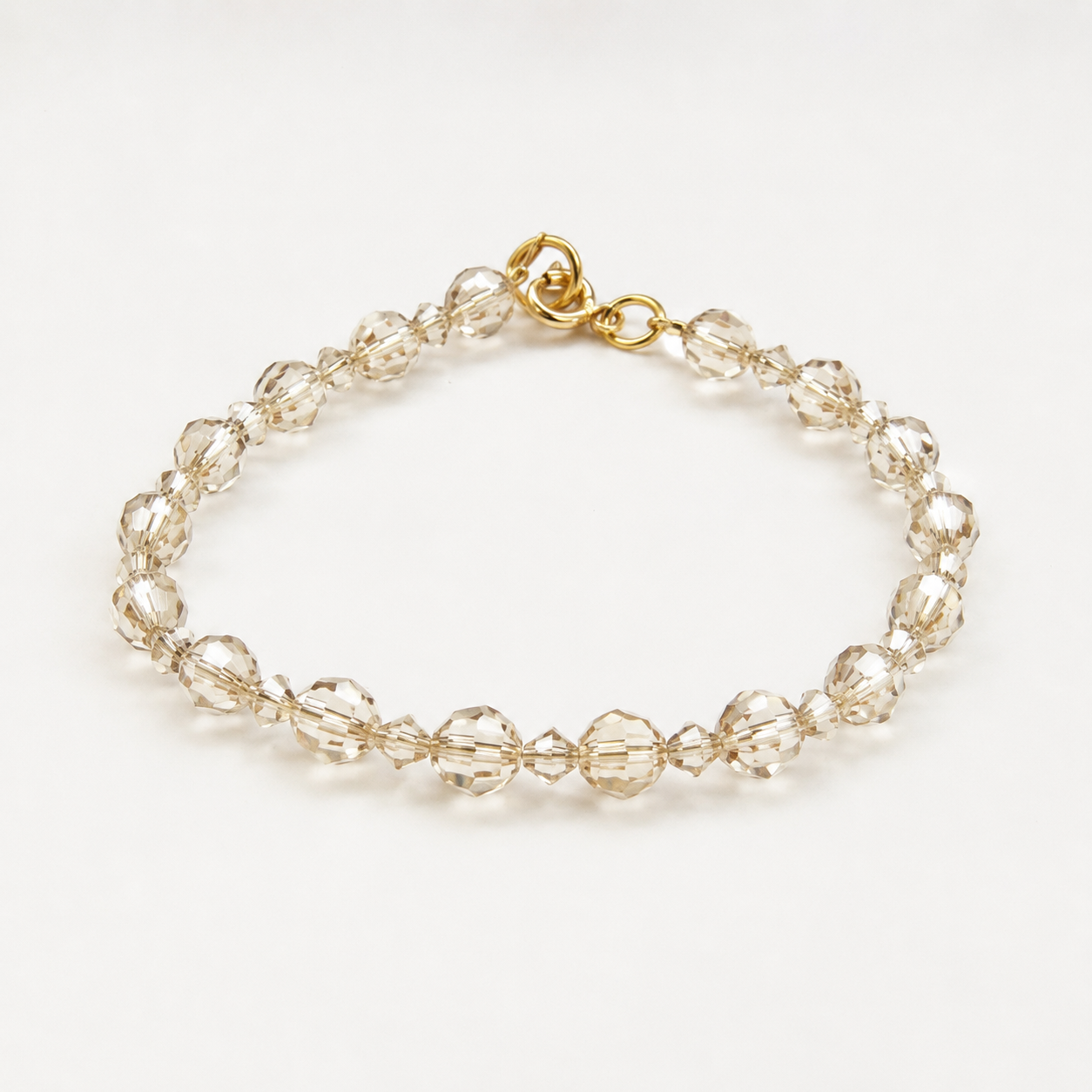 Pulsera cristal sombra dorada