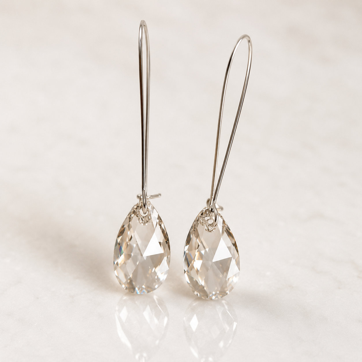 Long silver crystal earrings