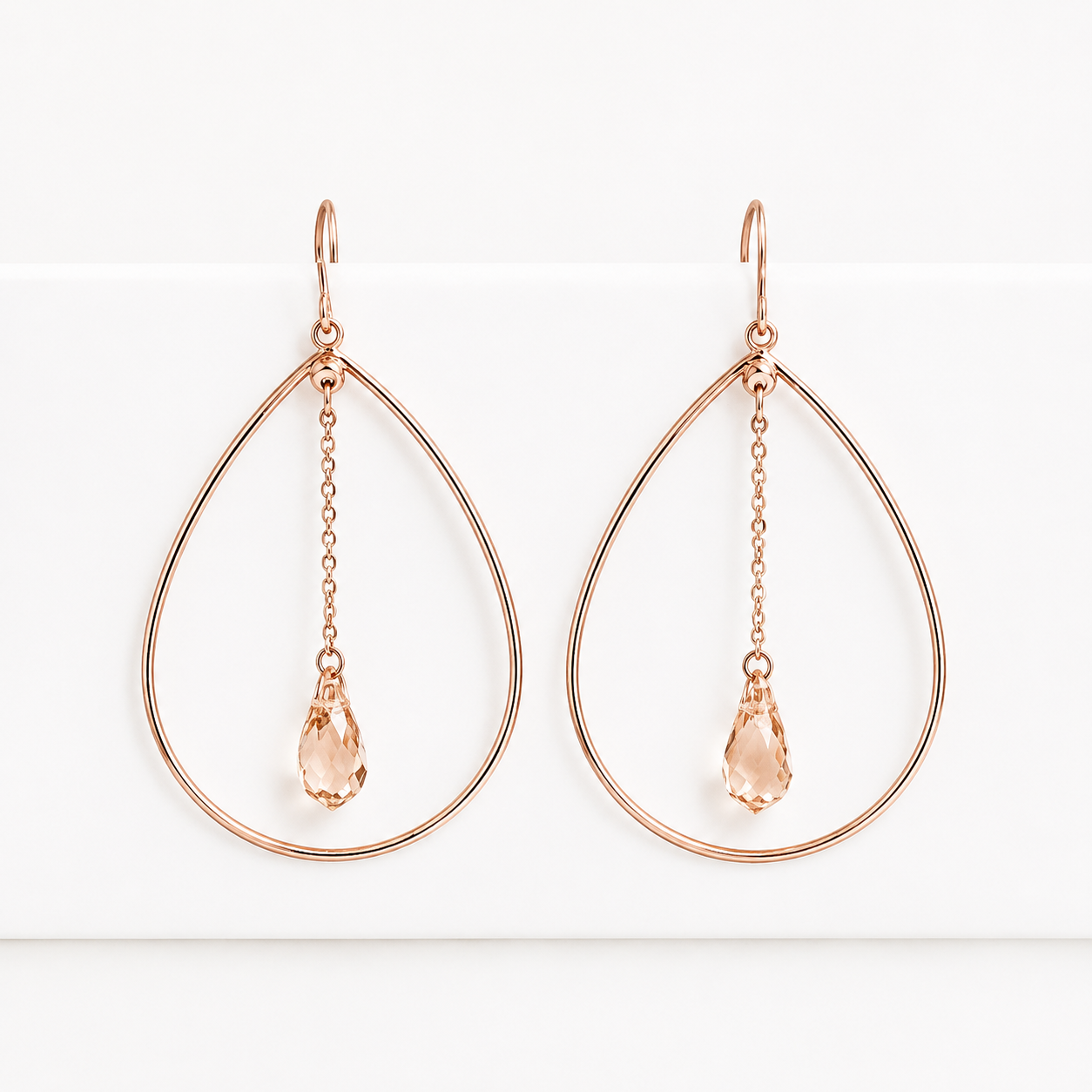 Teardrop hoop earrings with teardrop crystals