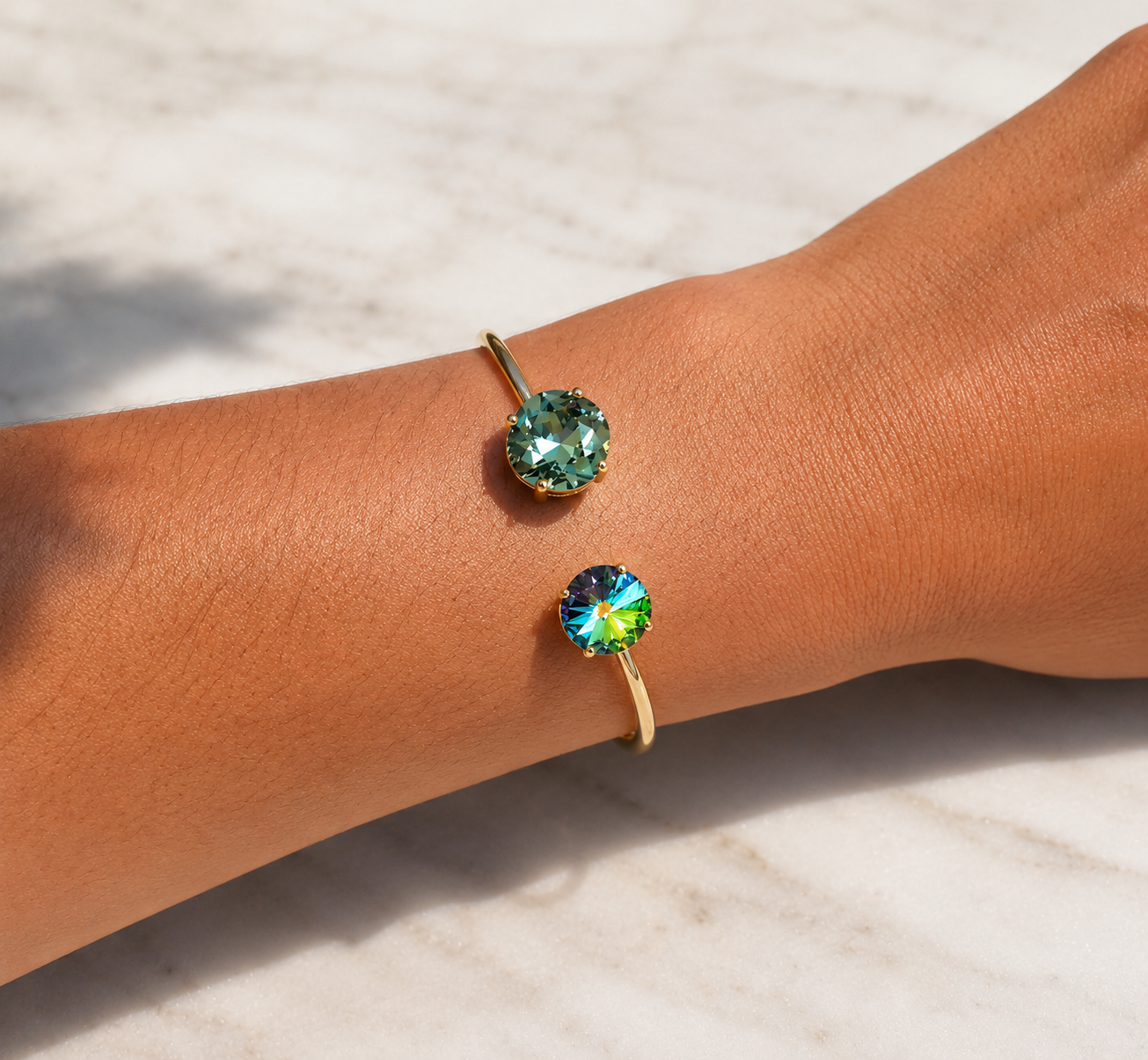 Gold open cuff bracelet in green crystal