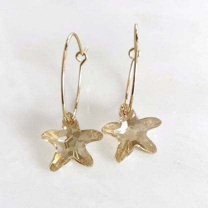 Gold starfish hoop earrings