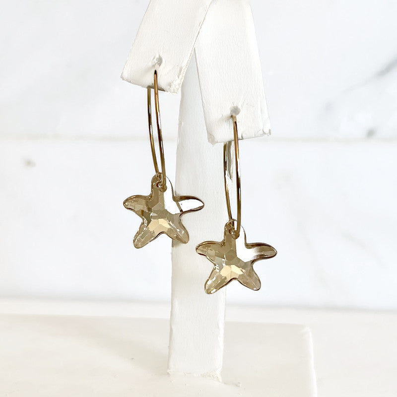 Gold starfish hoop earrings