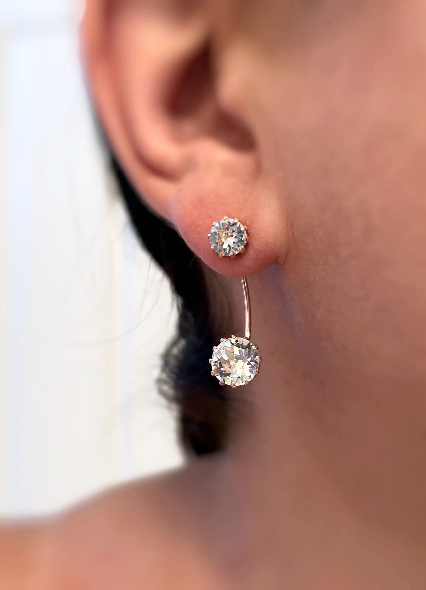 Clear crystal and rose gold ear jackets earrings