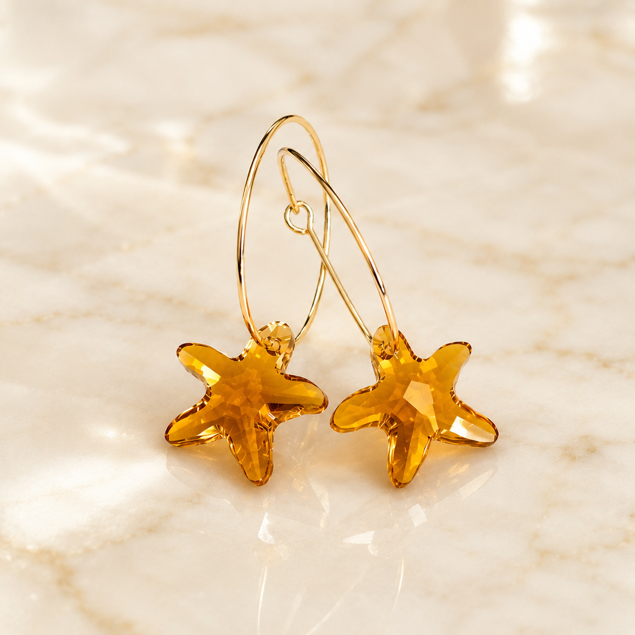 Pendientes aros estrella de mar dorados