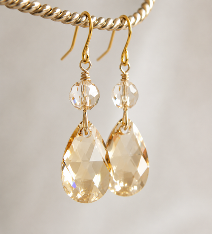 Pendientes colgantes de cristal dorado