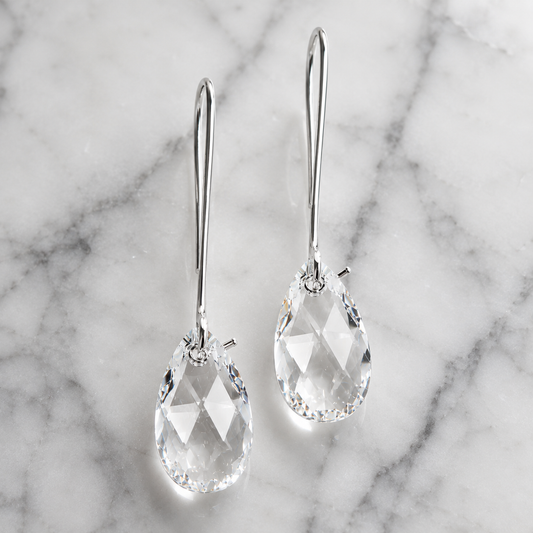 Pendientes largos con forma de lágrima de cristal en transparente