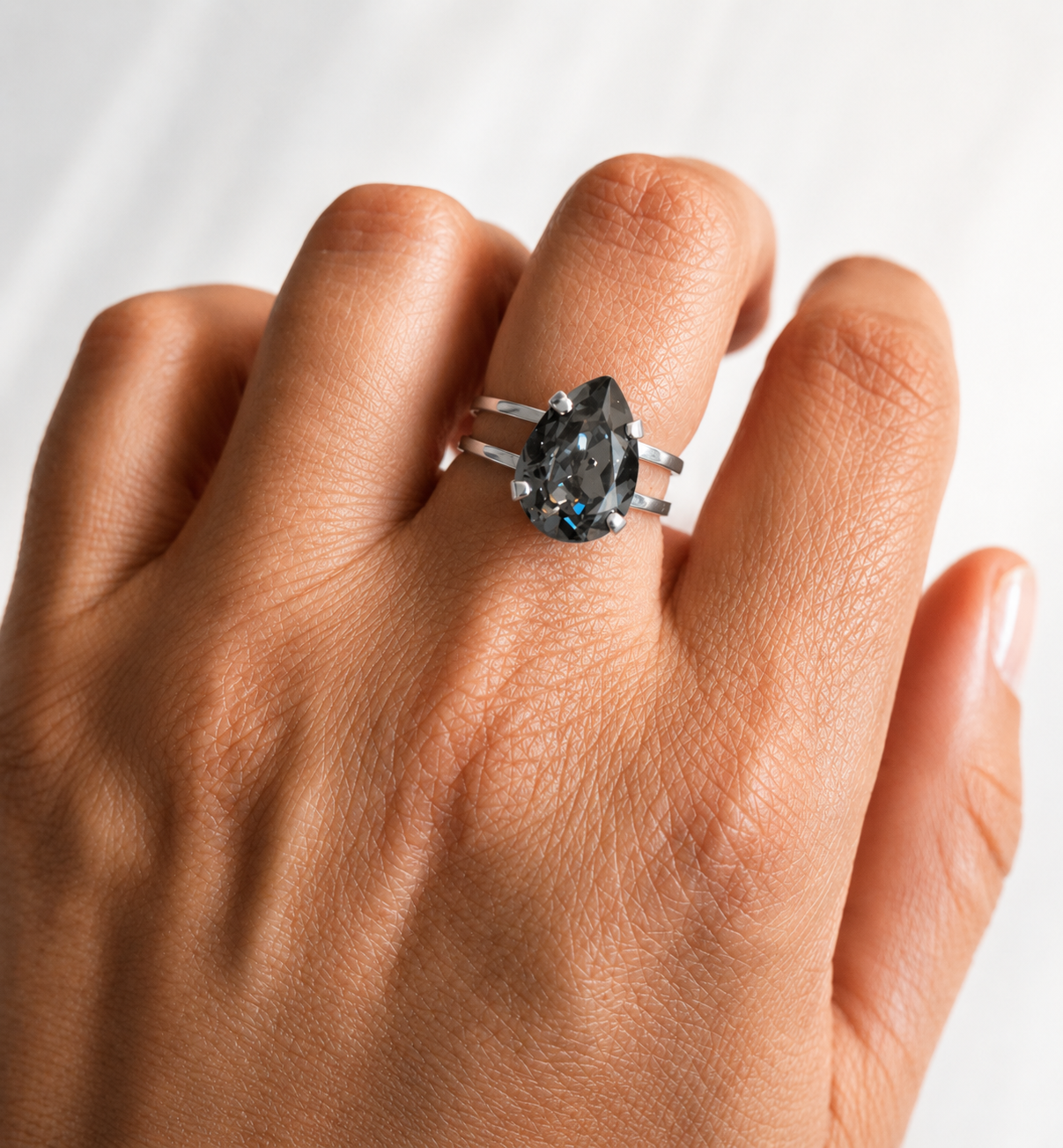 Black diamond pear crystal ring