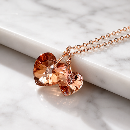 Collier deux coeurs en cristal en or rose