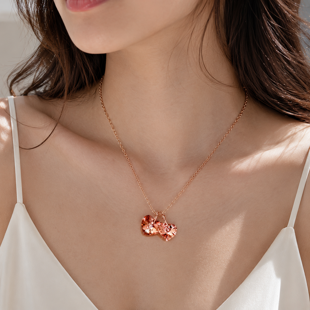 Collier deux coeurs en cristal en or rose