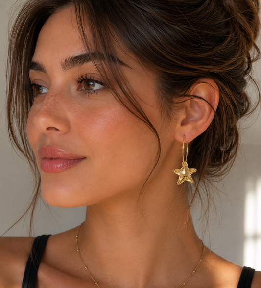 Gold starfish hoop earrings