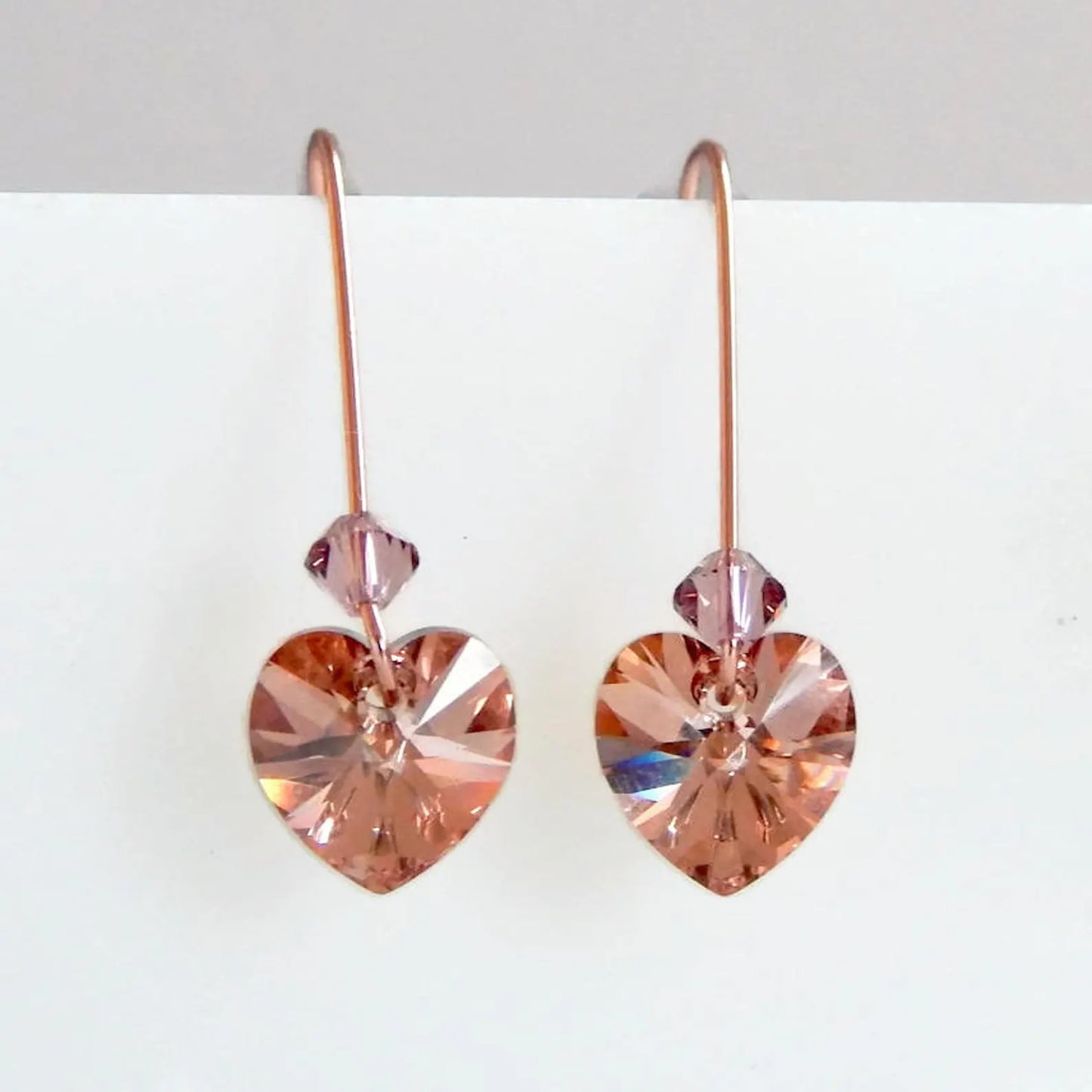 Pendientes de corazón de cristal rubor en oro rosa