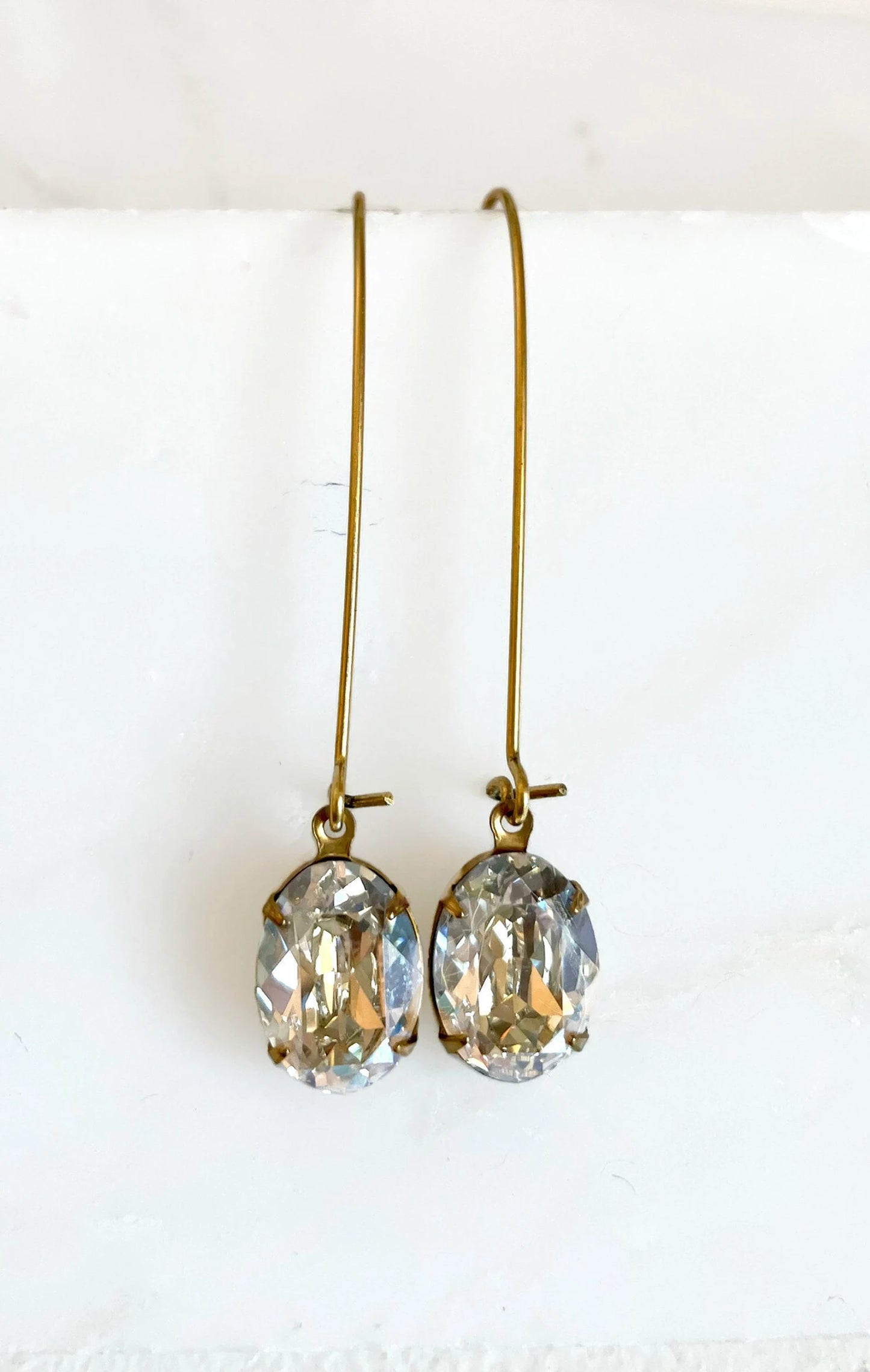 Long oval moonlight crystal earrings