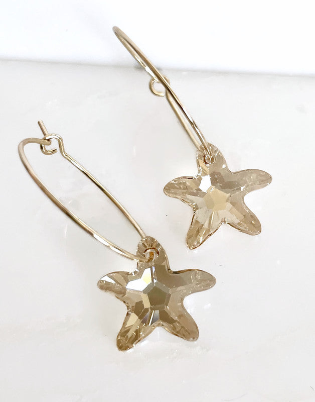 Gold starfish hoop earrings