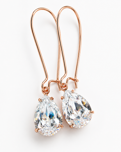 Pendientes de cristal transparente sobre oro rosa