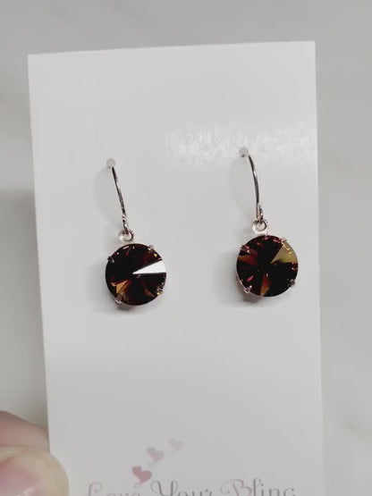 Pendientes de oro rosa con cristal marrón.