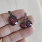Ruby red Swarovski Crystal Flat Briolette earrings on gunmetal