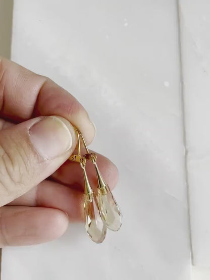 Golden teardrop capped crystal