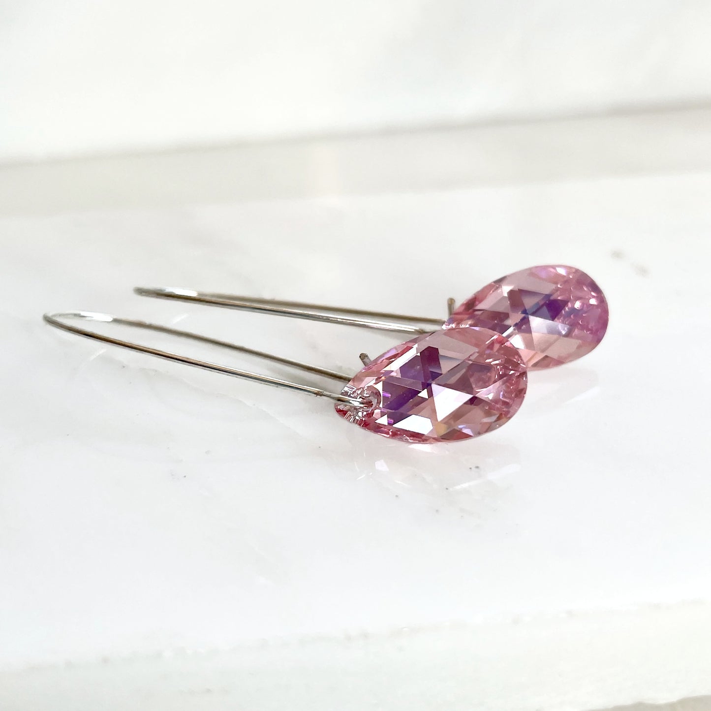Long iridescent pink crystal teardrop earrings