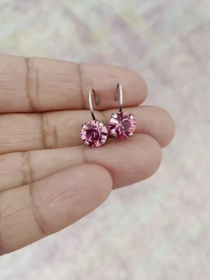 Boucles d'oreilles pendantes en cristal rose