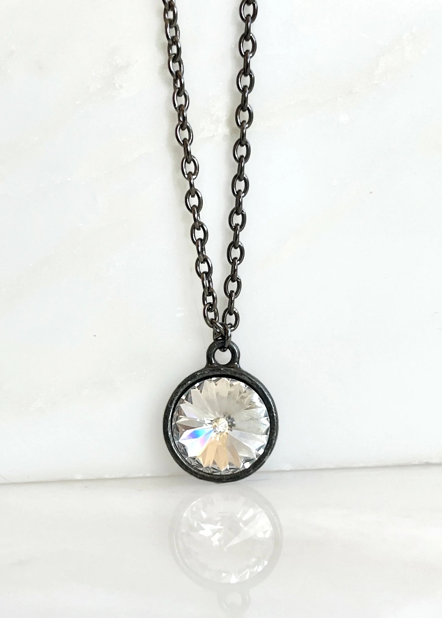 Crystal clear rivoli and gunmetal necklace