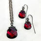 Ruby red Swarovski Crystal Flat Briolette earrings on gunmetal