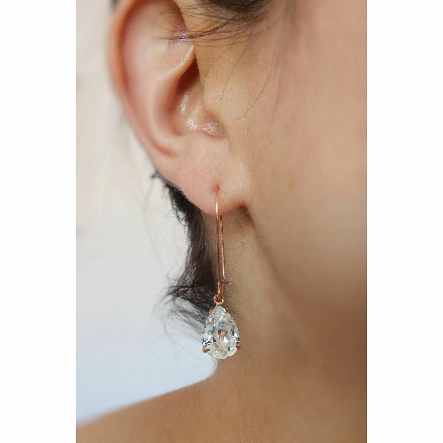 Clear crystal earrings on rose gold