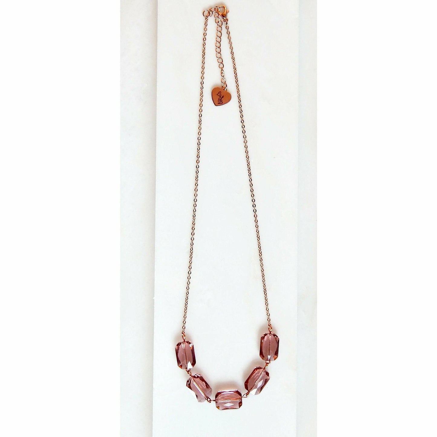 Collier en cristal taille émeraude rose blush