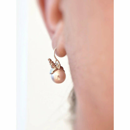 Boucles d'oreilles licorne perles roses