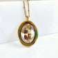Large gold oval crystal pendant