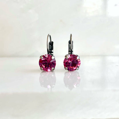 Boucles d'oreilles pendantes en cristal rose