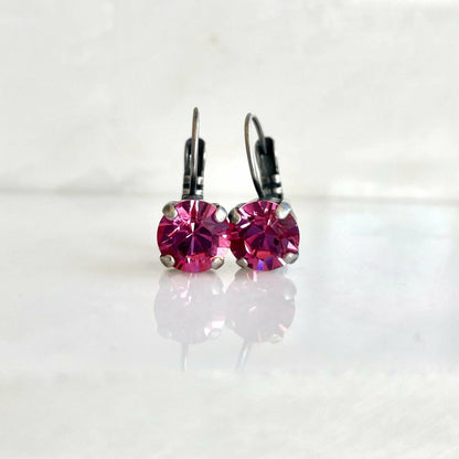 Boucles d'oreilles pendantes en cristal rose