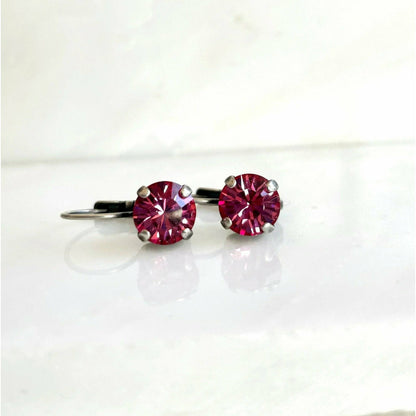 Boucles d'oreilles pendantes en cristal rose