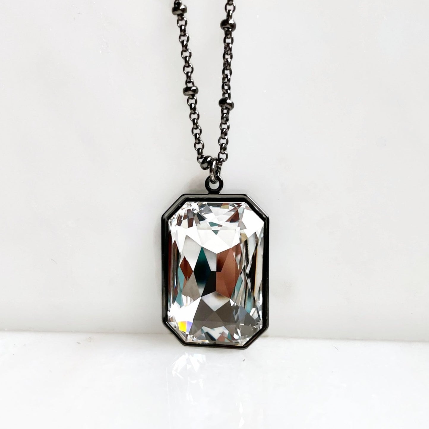 Gunmetal large clear crystal pendant