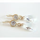 Clear crystal dangle earrings on matte gold