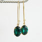 Oval emerald green crystal earrings